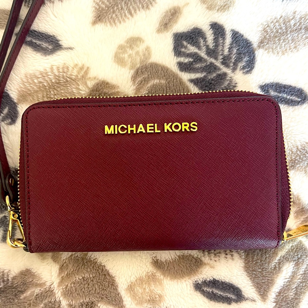 Michael Kors wine colored wristlet/wallet